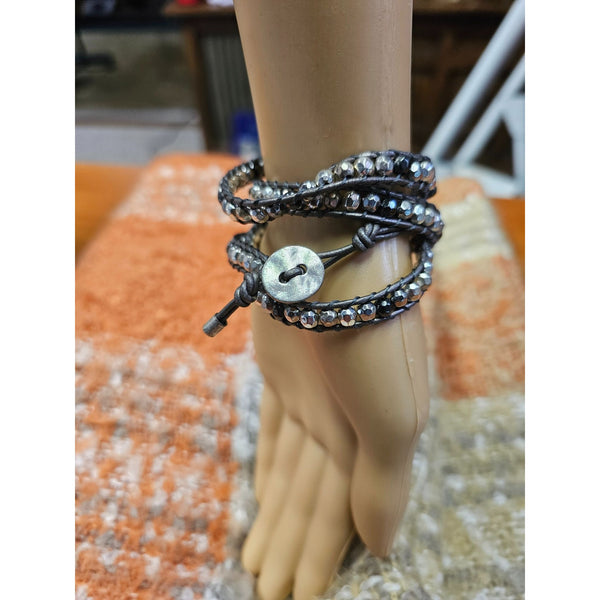 Wrap Bracelet. Set in Silver Leather with Faceted Silver and Black Beads, 31 In